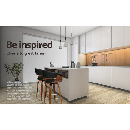 Jasper black PU leather swivel bar stools with walnut-finish timber frames at a modern kitchen island