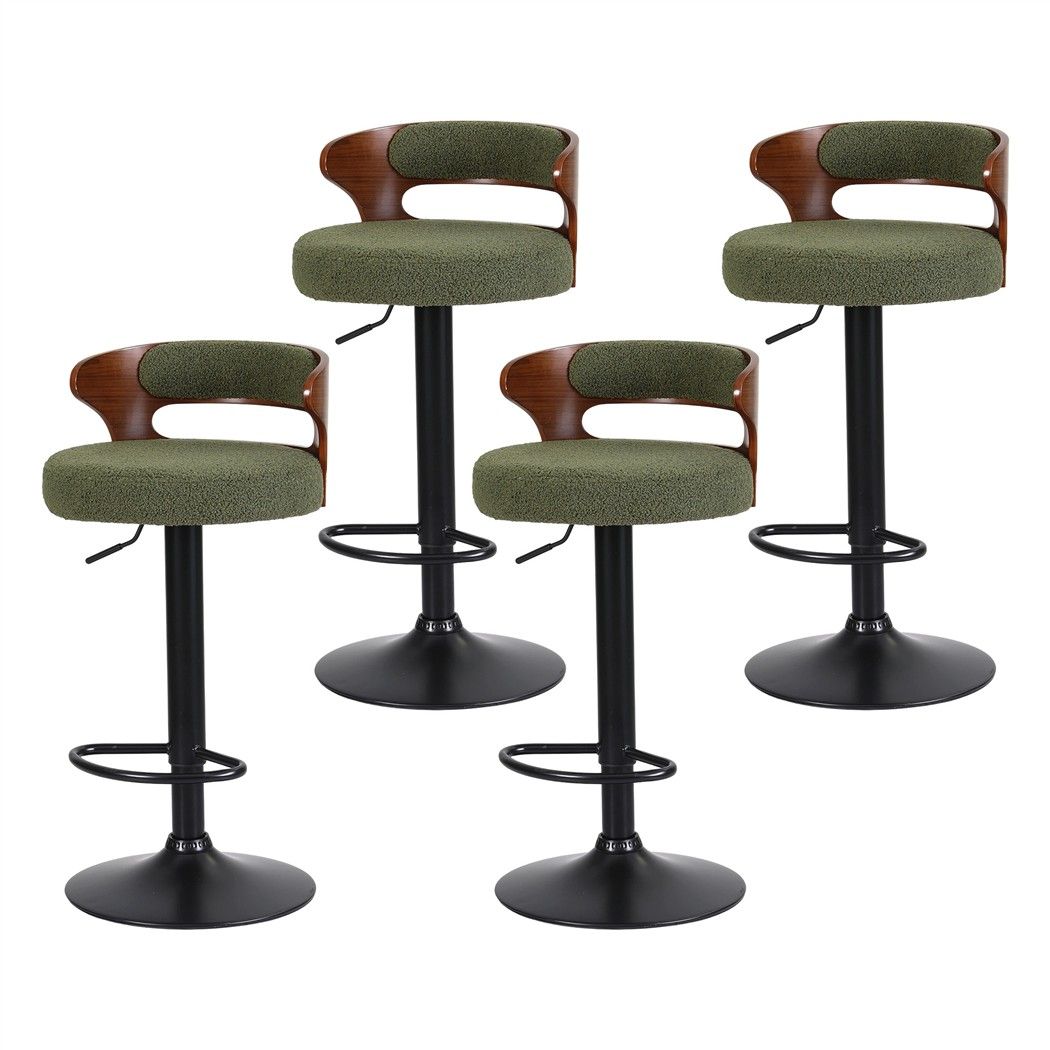 Set of 4 Juna green bouclé adjustable swivel bar stools with curved walnut-look backrests and black pedestal bases on a white background.