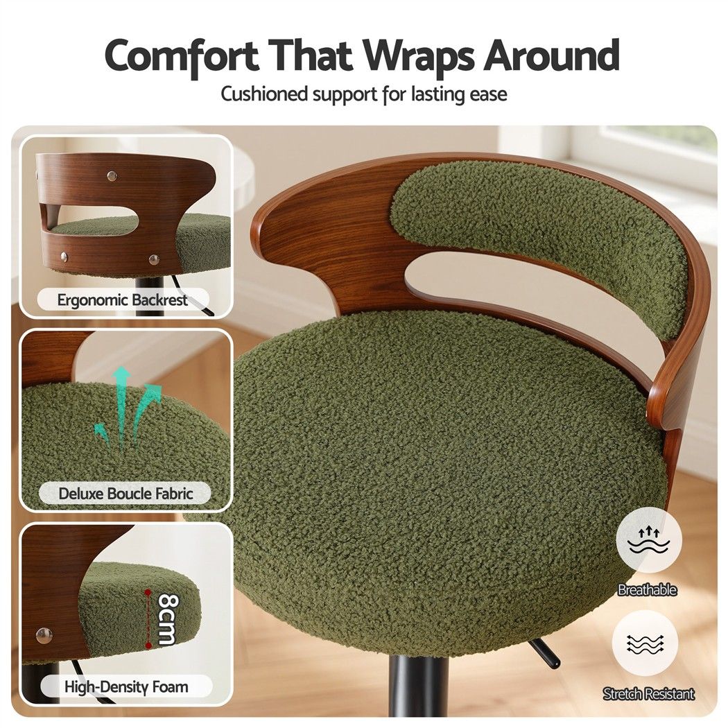 Close-up of Juna green bouclé bar stool showing curved padded backrest, upholstered seat and high-density foam cushion.