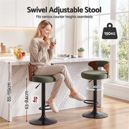 Juna adjustable green bouclé swivel bar stools in a kitchen showing 63–84cm seat height, 360-degree swivel and 150kg capacity.
