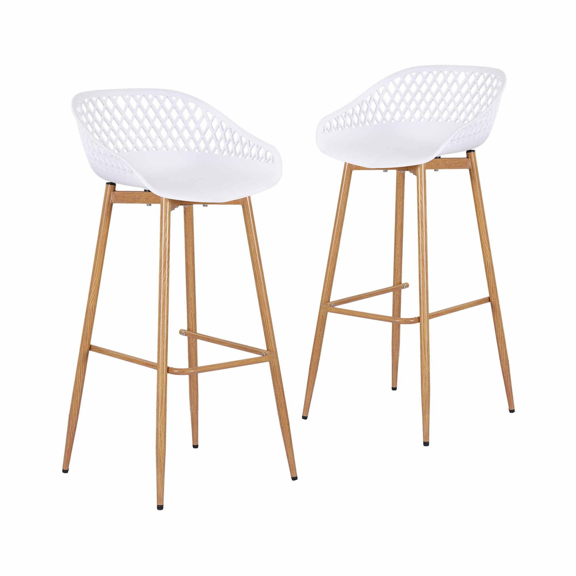 Set of two white Kian outdoor bar stools with lattice backrests and metal legs.