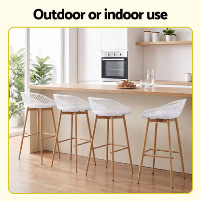 Set of four white Kian bar stools shown in a bright kitchen setting under the text 'Outdoor or indoor use'.