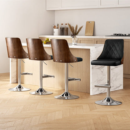 Set of four wooden bar stools in a modern kitchen setting with a black stool.