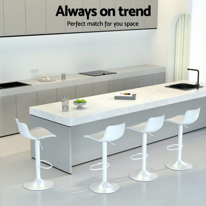 Modern kitchen with white island and stools, featuring text 'Always on trend Perfect match for you space'.