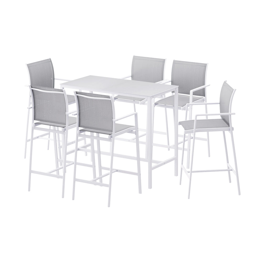 White dining table with six matching grey bar stools on a white background