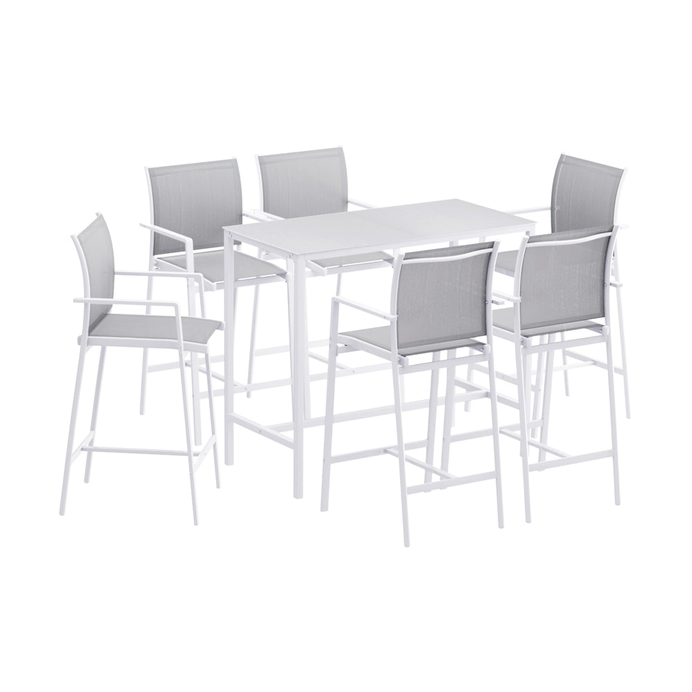 White dining table with four grey chairs on a white background