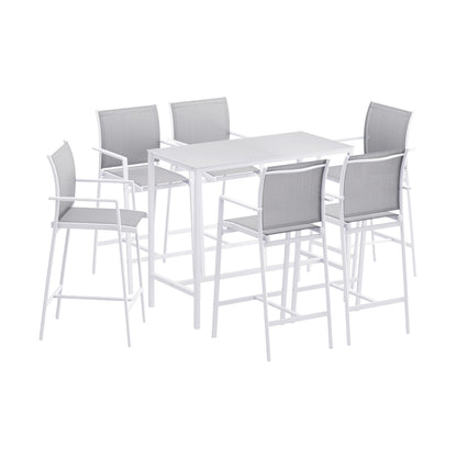 White dining table with four grey chairs on a white background