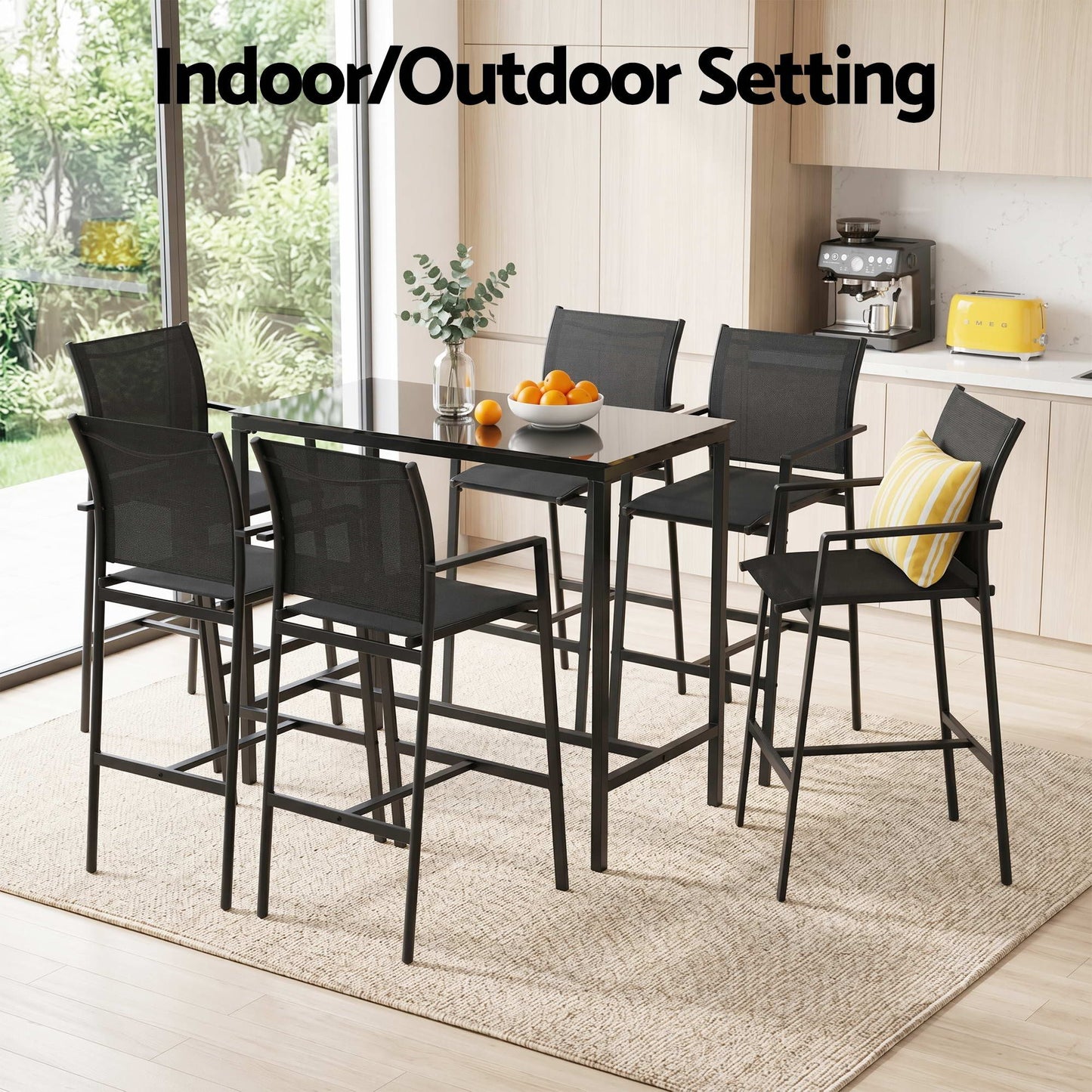 Black dining table with chairs in a modern kitchen setting
