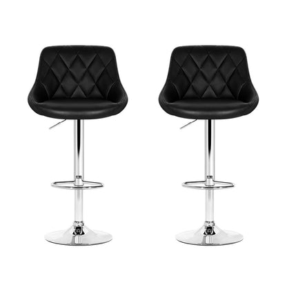 Two matching black bar stools with diamond-quilted faux leather seats and polished chrome bases, shown side by side on a white background.
