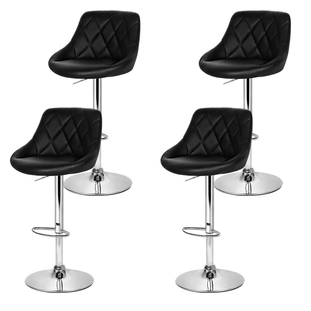 Four black quilted bar stools with chrome bases on a white background