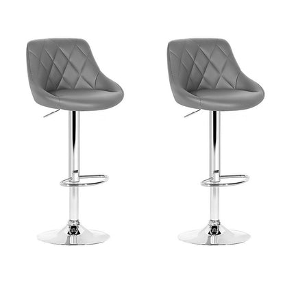 Two modern bar stools with grey quilted faux leather seats and chrome adjustable pedestal bases, shown side by side on a white background.