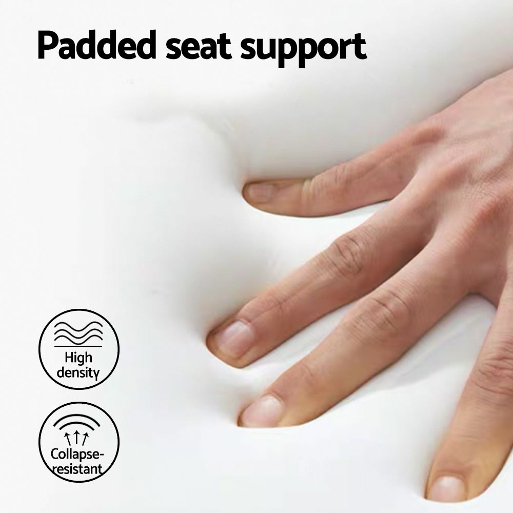Hand pressing into a white padded seat support with high-density and collapse-resistant icons.