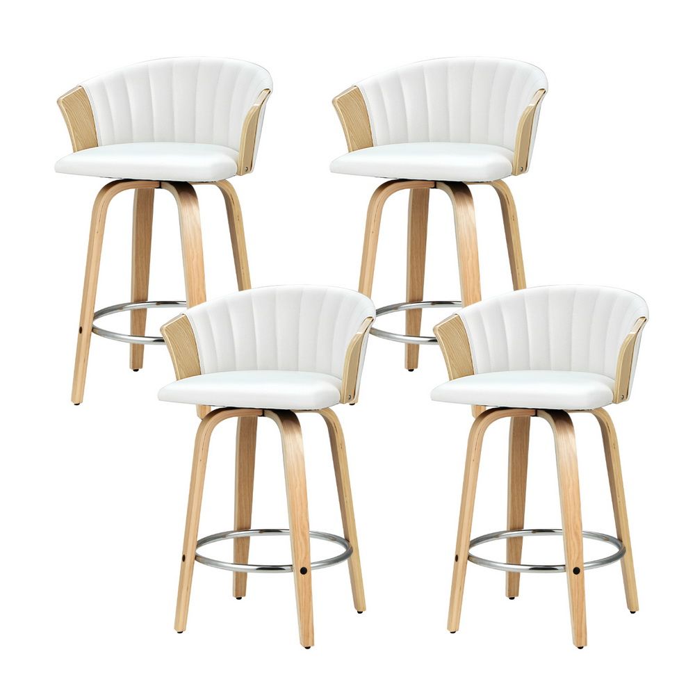 Four white bar stools with wooden legs on a white background
