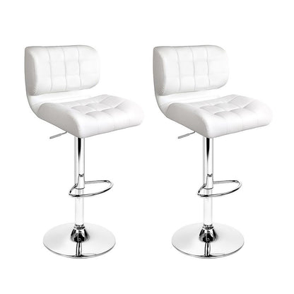 Two white bar stools with chrome legs on a white background