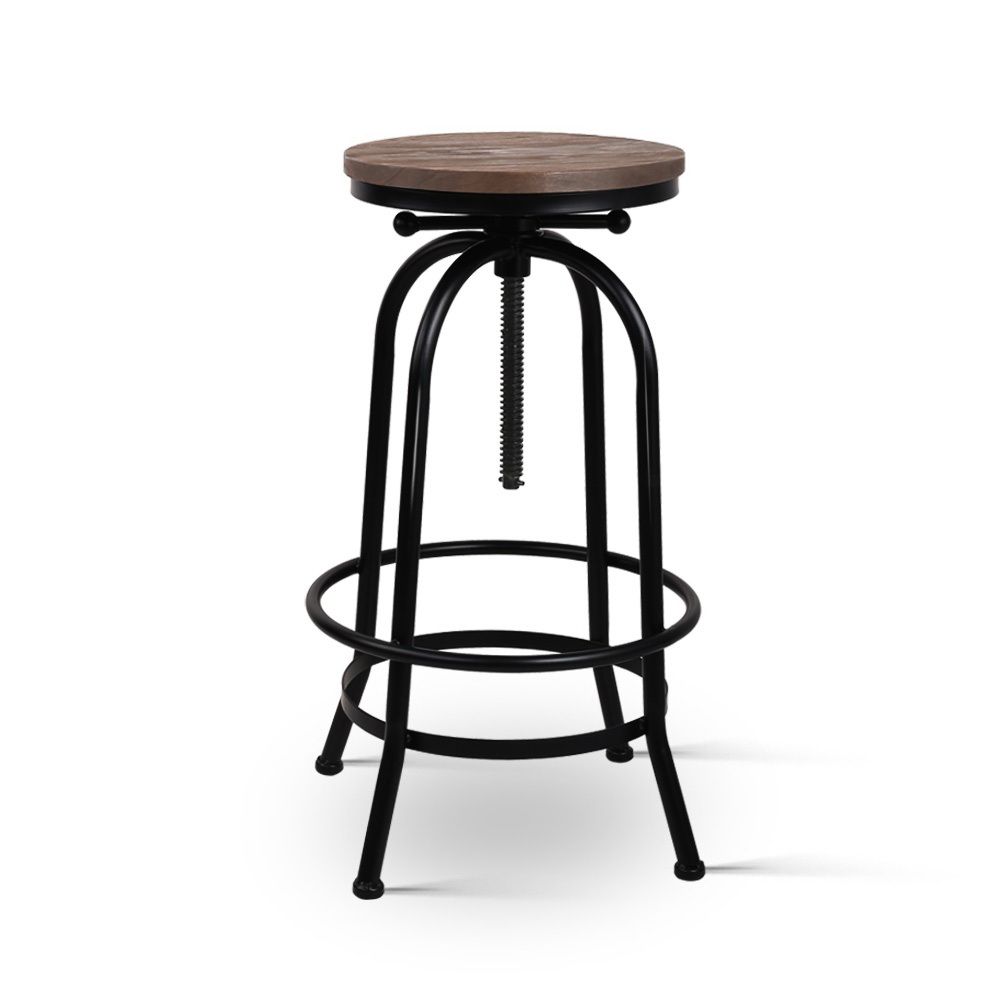 The Zane industrial bar stool with a round  swivel bar stool with a brown wooden seat and a black metal frame featuring a central height-adjustable screw mechanism and footrest ring